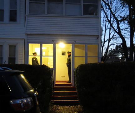 State Police guard the home of 74 Elmwood Road while crime scene investigators conduct a thorough search