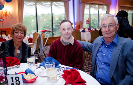 merican Training Guest Mike James of Andover and his parents enjoy the second annual Celebrate Good Times Gala at the Andover Country Club on May 16. Photo by Felix Khut.
