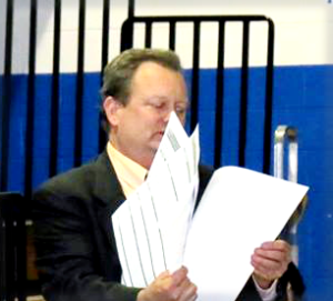 Lawrence City Clerk William Maloney with absentee ballots during the 2013 mayoral recount. 