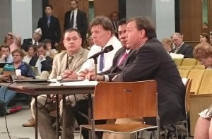 LAwrence City Councilor Marc Laplante (foreground) tells the legislature why Lawrence needs higher fines for those caught illegally dumping. 